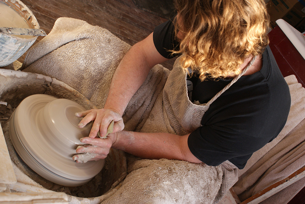 Newschool pottery - centering clay on potters wheel